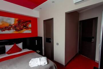 Фото номера Улучшенный одноместный номер Отель Mildom Premium Hotel г. Алматы 7