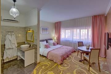 Фото номера Стандартный двухместный номер с 1 кроватью Отель Beis Spa Hotel Resort г. Алматы 15