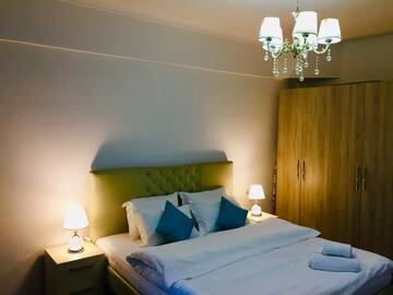 Фото Апартаменты QonaQ Apartments 98/2 г. Алматы 2