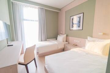 Фото номера Стандартный двухместный номер с 2 отдельными кроватями Отель Resident City Hotel г. Алматы 3