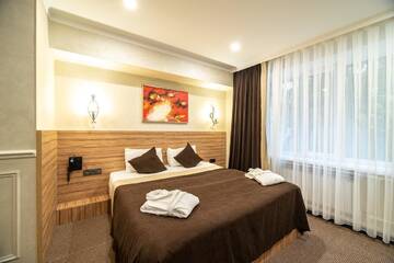 Фото Отель Mildom City Hotel г. Алматы 1