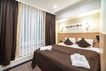 Фото номера Одноместный номер Делюкс Отель Mildom City Hotel г. Алматы 6