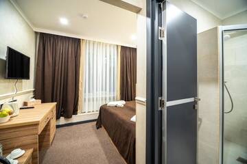Фото номера Одноместный номер Делюкс Отель Mildom City Hotel г. Алматы 15