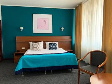 Фото номера Двухместный номер Делюкс с 1 кроватью Отель Mika City Hotel г. Алматы 3