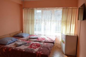 Фото номера Двухместный номер с 2 отдельными кроватями Отель Hotel Kezdesu г. Алматы 6
