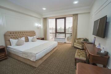 Фото номера Номер Делюкс Отель Plaza Hotel Almaty г. Алматы 5
