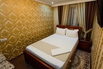 Фото номера Люкс с 2 спальнями Отель Salut Hotel Almaty г. Алматы 2