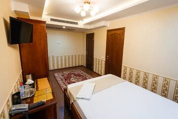 Фото номера Люкс с 2 спальнями Отель Salut Hotel Almaty г. Алматы 4