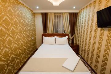 Фото номера Люкс с 2 спальнями Отель Salut Hotel Almaty г. Алматы 7