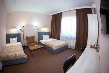 Фото номера Стандартный двухместный номер с 2 отдельными кроватями Отель Keremet Hotel г. Алматы 28