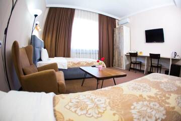 Фото номера Стандартный двухместный номер с 2 отдельными кроватями Отель Keremet Hotel г. Алматы 30