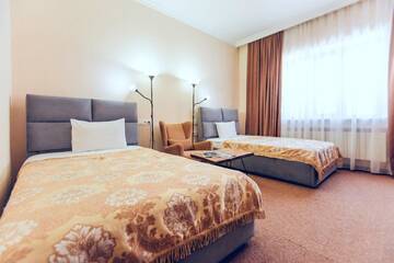 Фото номера Стандартный двухместный номер с 2 отдельными кроватями Отель Keremet Hotel г. Алматы 10