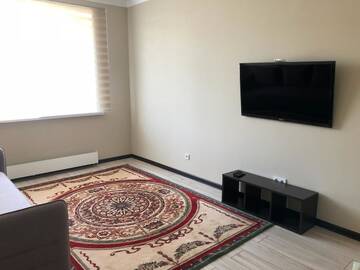 Фото номера Апартаменты с 1 спальней Апартаменты Abay 109/6, Legenda apartment г. Алматы 7