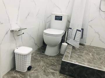 Фото номера Одноместный номер с общим душем и туалетом Отели типа «постель и завтрак» Gagarin Park Halal Apartments г. Алматы 8