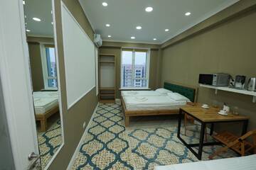 Фото Отели типа «постель и завтрак» Gagarin Park Halal Apartments г. Алматы 5