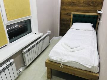 Фото номера Небольшой одноместный номер Отели типа «постель и завтрак» Gagarin Park Halal Apartments г. Алматы 3