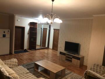 Фото Апартаменты Nurly Tau Apartment г. Алматы 2