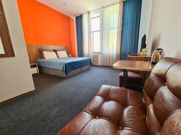 Фото номера Улучшенный номер с кроватью размера «king-size» Отель City Rooms Almaty г. Алматы 8