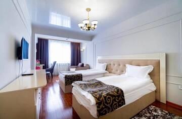 Фото номера Апартаменты с 1 спальней Апартаменты Vavilon Apartmens г. Алматы 11