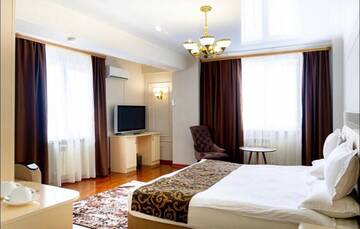 Фото номера Апартаменты с 1 спальней Апартаменты Vavilon Apartmens г. Алматы 9