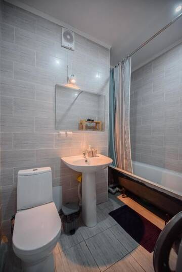 Фото номера Апартаменты с 1 спальней Апартаменты Almaty Smart Apartment- Simfoniya г. Алматы 26