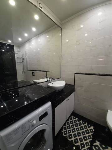 Фото номера Апартаменты с 2 спальнями Апартаменты 2 bedroom apartment г. Алматы 8