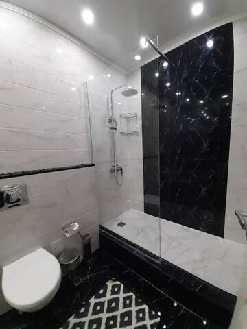 Фото номера Апартаменты с 2 спальнями Апартаменты 2 bedroom apartment г. Алматы 7