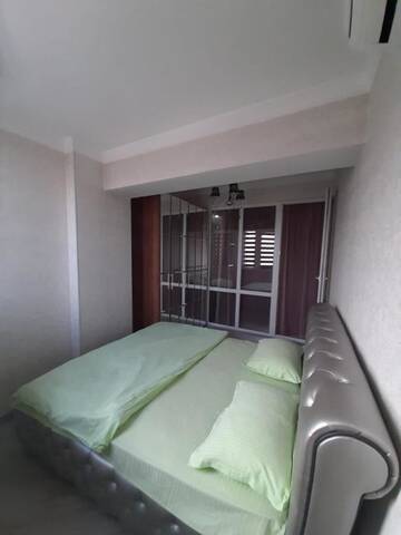 Фото номера Апартаменты с 2 спальнями Апартаменты 2 bedroom apartment г. Алматы 10