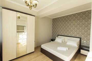 Фото номера Апартаменты с 2 спальнями Апартаменты Residential Сomplex Central 270 г. Алматы 7