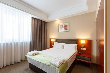 Фото номера Апартаменты с 1 спальней Отель Renion Residence Hotel г. Алматы 19
