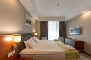 Фото номера Апартаменты с 1 спальней Отель Renion Residence Hotel г. Алматы 5