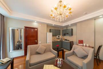 Фото номера Апартаменты с 1 спальней Отель Renion Residence Hotel г. Алматы 2