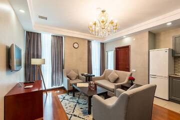 Фото номера Апартаменты с 1 спальней Отель Renion Residence Hotel г. Алматы 3