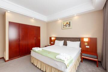 Фото номера Апартаменты с 1 спальней Отель Renion Residence Hotel г. Алматы 14
