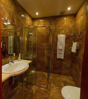 Фото номера Стандартный двухместный номер с 1 кроватью Отель JEPPESEN RESIDENCE г. Алматы 3