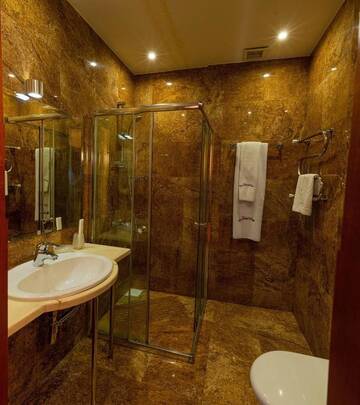 Фото номера Стандартный двухместный номер с 1 кроватью Отель JEPPESEN RESIDENCE г. Алматы 7