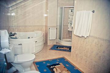 Фото номера Улучшенный люкс Курортные отели Shymbulak Resort Hotel г. Алматы 10