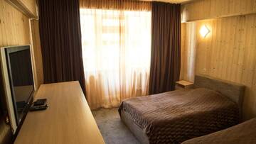 Фото номера Полулюкс Курортные отели Shymbulak Resort Hotel г. Алматы 4