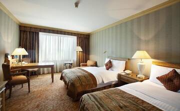 Фото номера Двухместный номер Делюкс с 2 отдельными кроватями Отель InterContinental Almaty г. Алматы 2