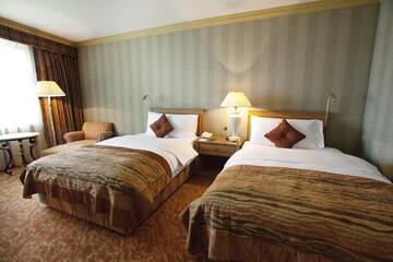 Фото номера Двухместный номер Делюкс с 2 отдельными кроватями Отель InterContinental Almaty г. Алматы 10