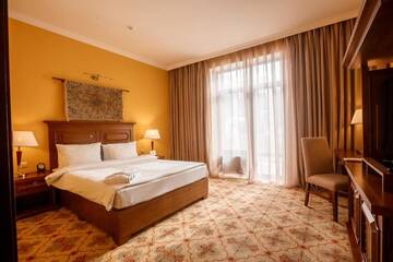 Фото номера Двухместный номер Делюкс с 1 кроватью Курортные отели Samal Resort &amp; SPA г. Алматы 5