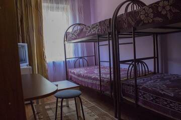 Фото номера Односпальная кровать в общем номере с 4 кроватями Отель Hotel Tahar г. Алматы 2