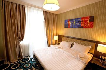 Фото номера Улучшенный одноместный номер Отель Mildom Hotel г. Алматы 5