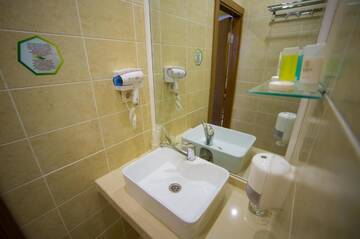 Фото номера Улучшенный одноместный номер Отель Mildom Hotel г. Алматы 8