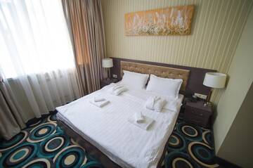 Фото номера Улучшенный одноместный номер Отель Mildom Hotel г. Алматы 6