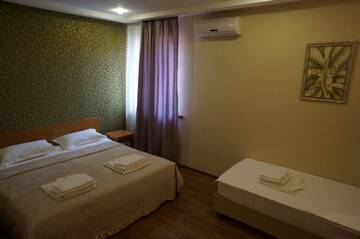 Фото номера Классический семейный номер Отель Grushevy Hospitality Boutique г. Алматы 3