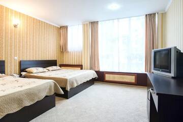 Фото номера Стандартный трехместный номер Отель Hotel Kazakhfilm г. Алматы 5